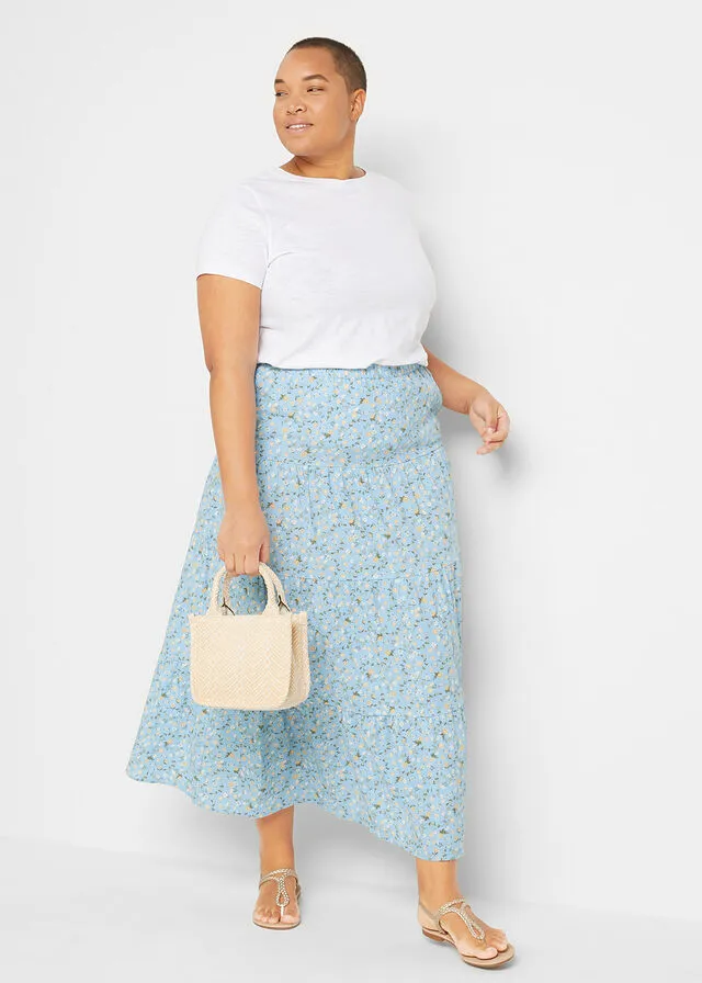 Falda larga con volantes azul claro con flores
