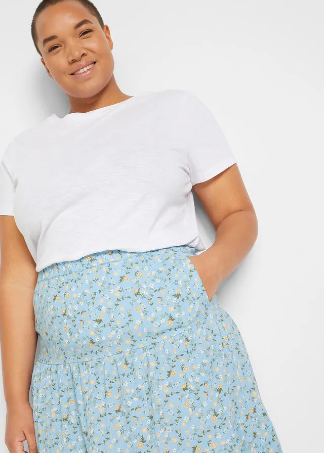 Falda larga con volantes azul claro con flores