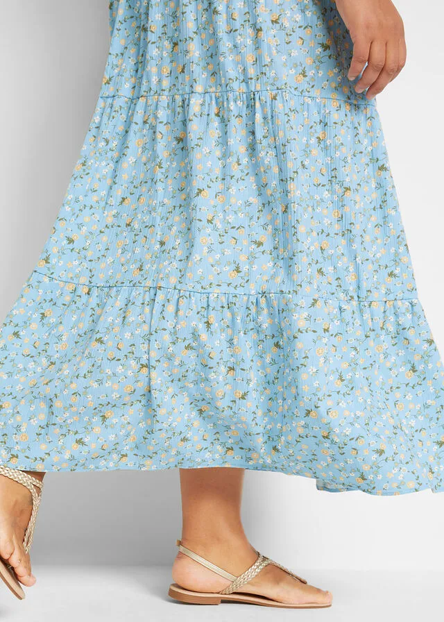 Falda larga con volantes azul claro con flores