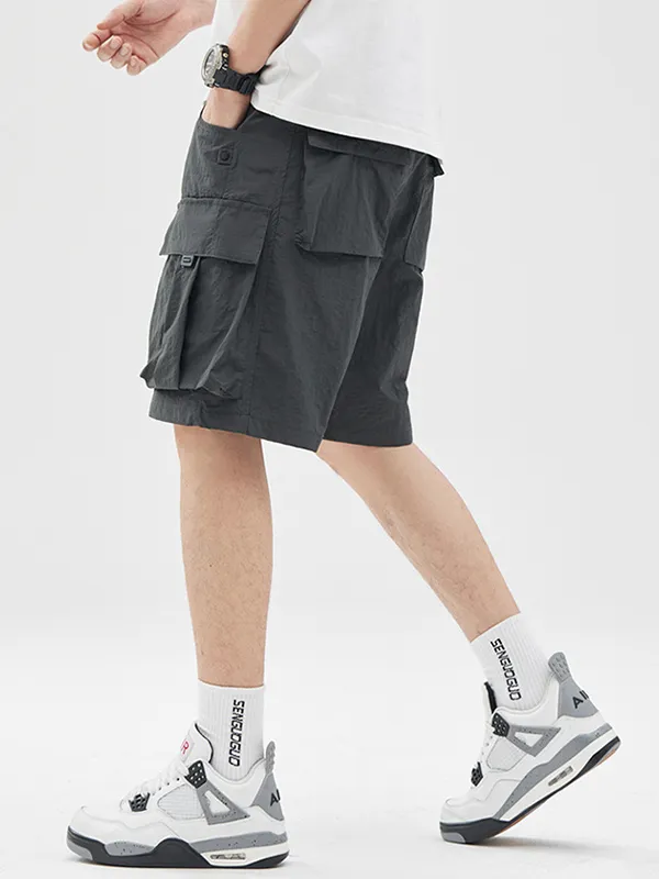Pantalones cortos cargo sueltos con múltiples bolsillos para exteriores para hombre