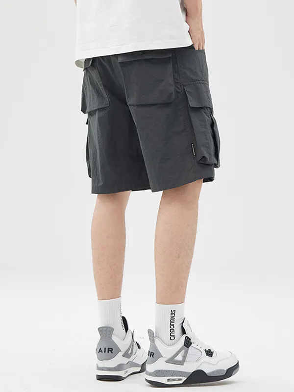 Pantalones cortos cargo sueltos con múltiples bolsillos para exteriores para hombre