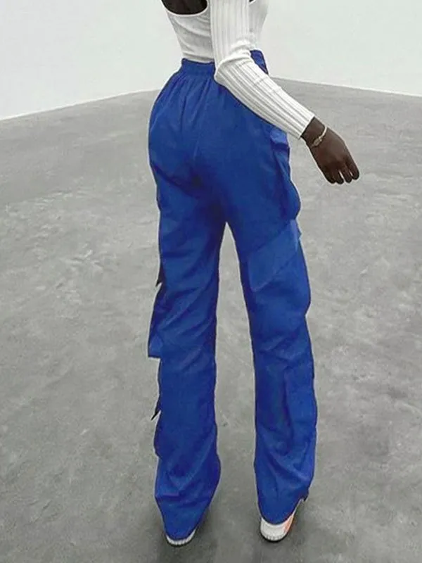 Pantalones de pierna recta con bolsillo con corte en V