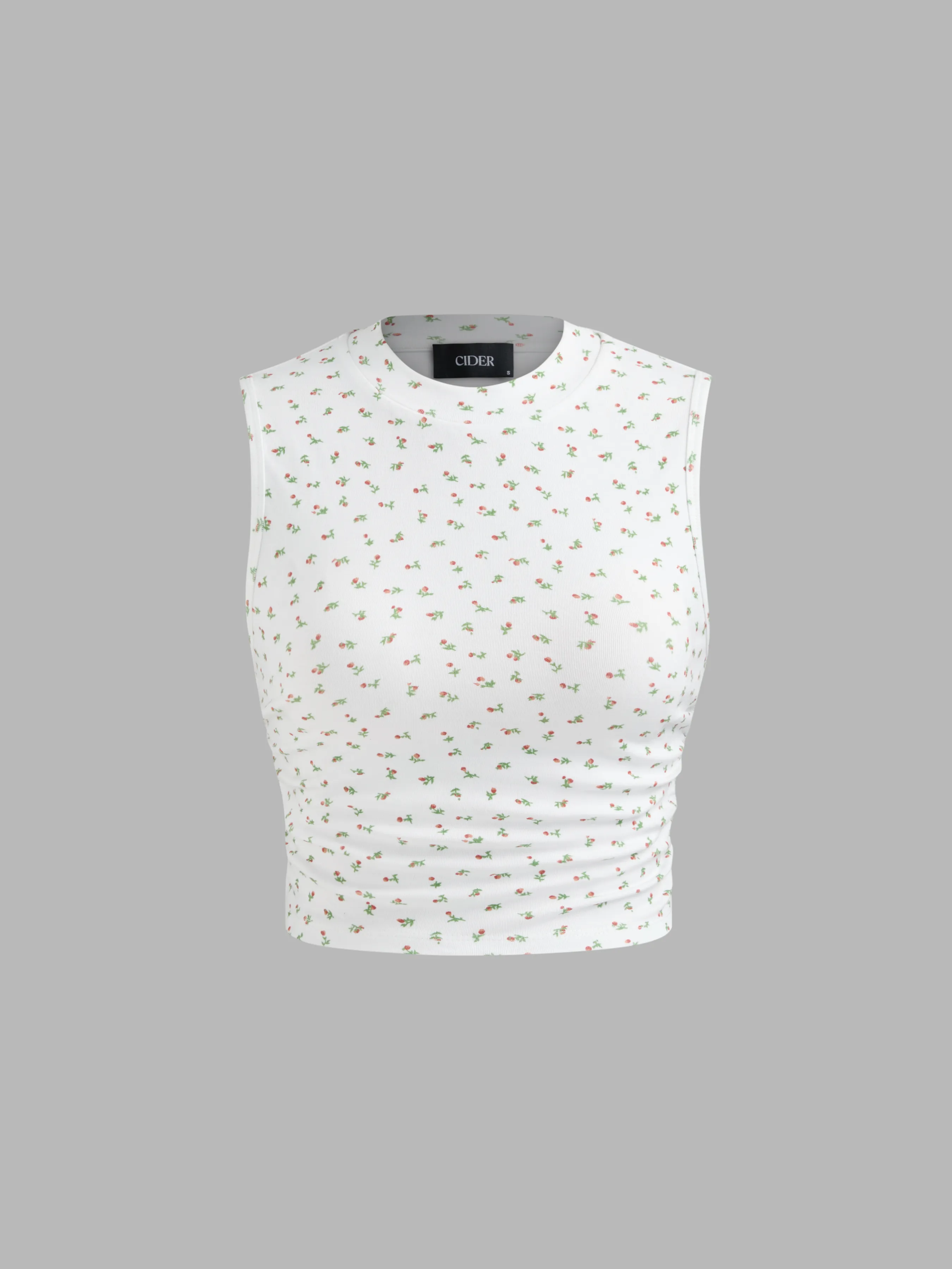 Top corto fruncido con estampado floral y cuello redondo