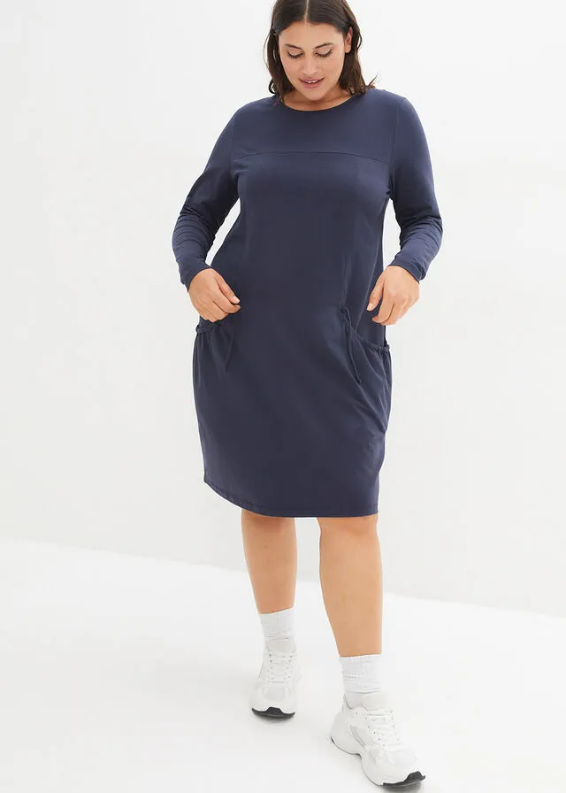 Vestido extragrande con bolsillos, con vuelo Negro