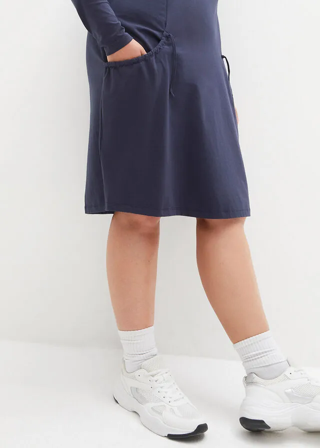 Vestido extragrande con bolsillos, con vuelo Negro