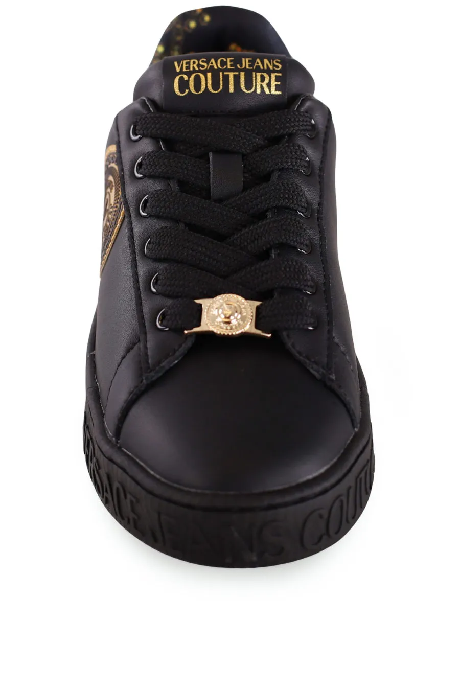 Zapatillas negras con logo dorado